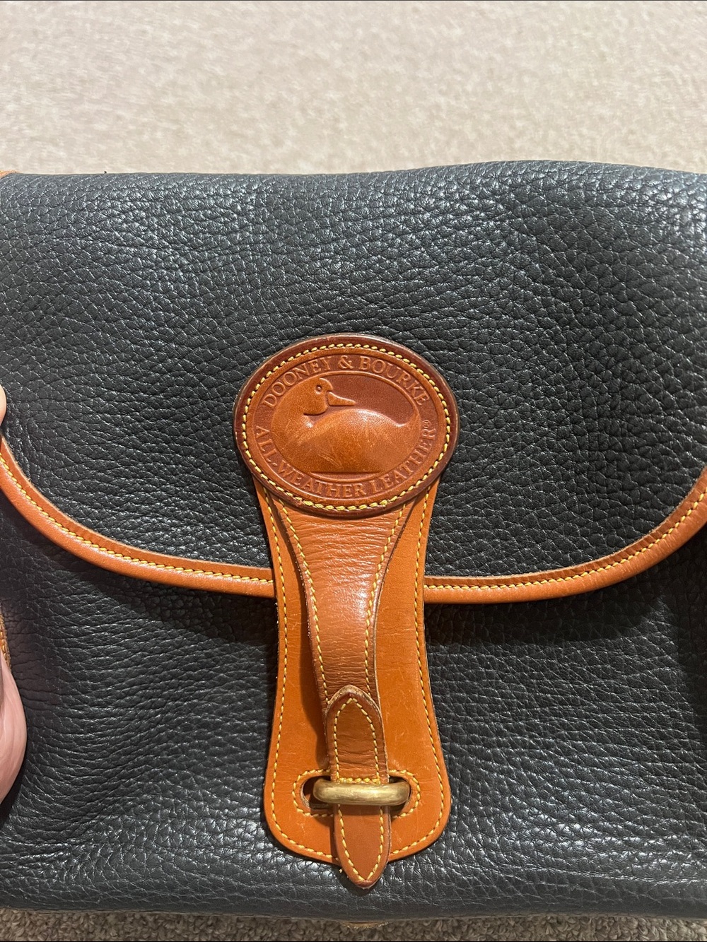 Dooney & Bourke Black Pebbled Leather Messenger with Tan Trim